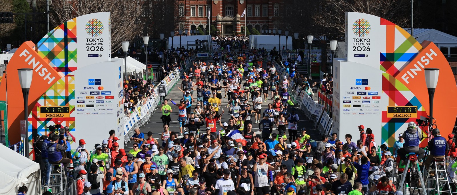 A massive crowd of runners approaching the finish at the Tokyo Marathon